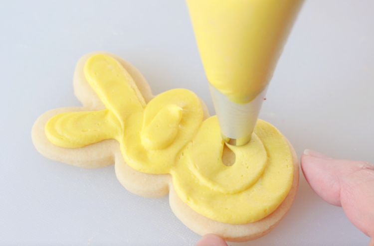 bunny sugar cookie frosted with yellow buttercream
