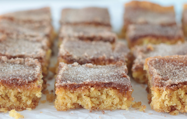 snickerdoodle bars on parchment paper