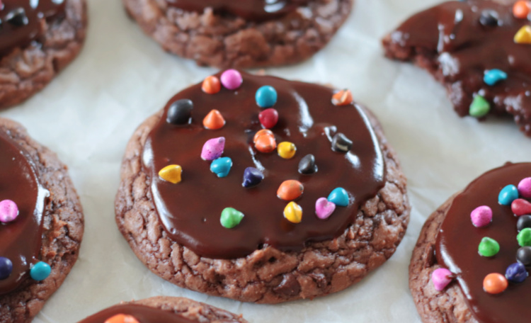 cosmic brownie cookies on parchment paper