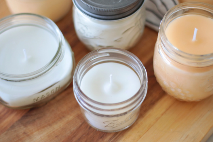 white beeswax candle in jar