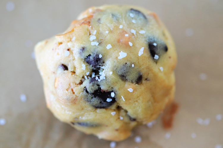 ball of cookie dough with salt sprinkled on top