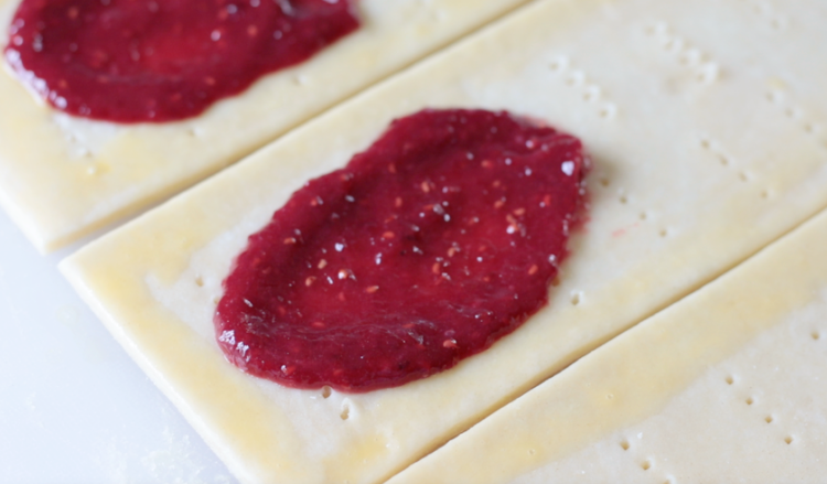 pop tart pie crust with raspberry filling spooned into center