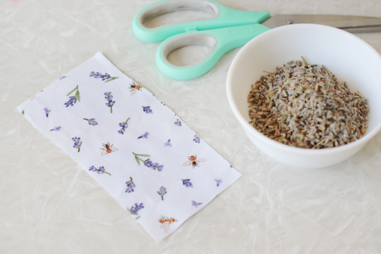 rectangle of fabric and bowl of dried lavender