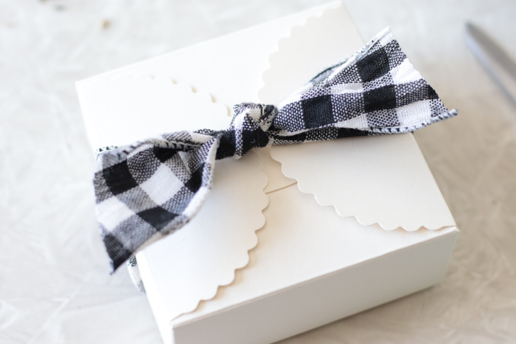 box of lavender sachets tied with a ribbon