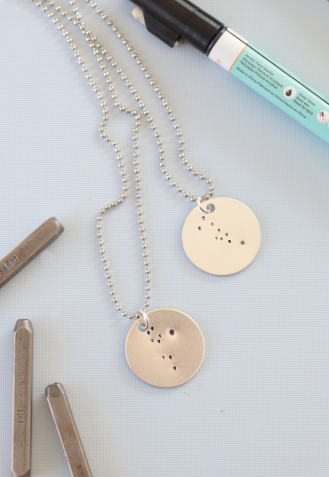 two stamped constellation necklaces