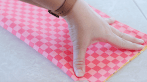 hand folding fabric square in half