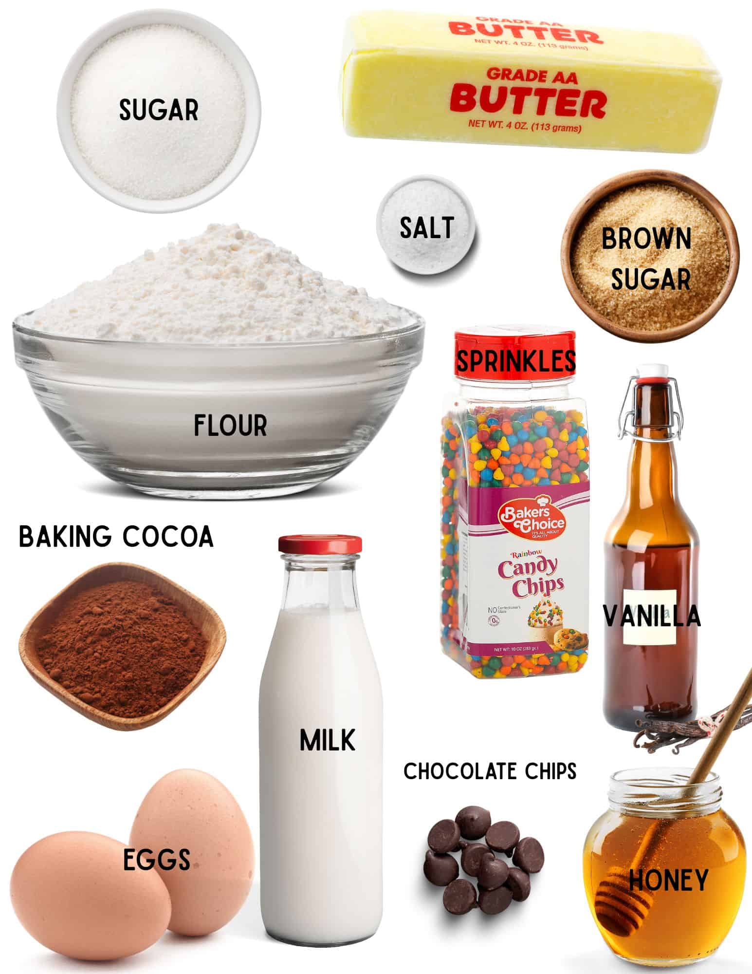 Bowls of flour, sugar, brown sugar, salt, coco powder, 2 eggs, bottle of milk, bottle of sprinkles, chocolate chips, jar of honey, bowl of brown sugar, bottle of vanilla and stick of butter.