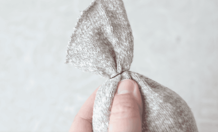 sock tied off with a hair tie