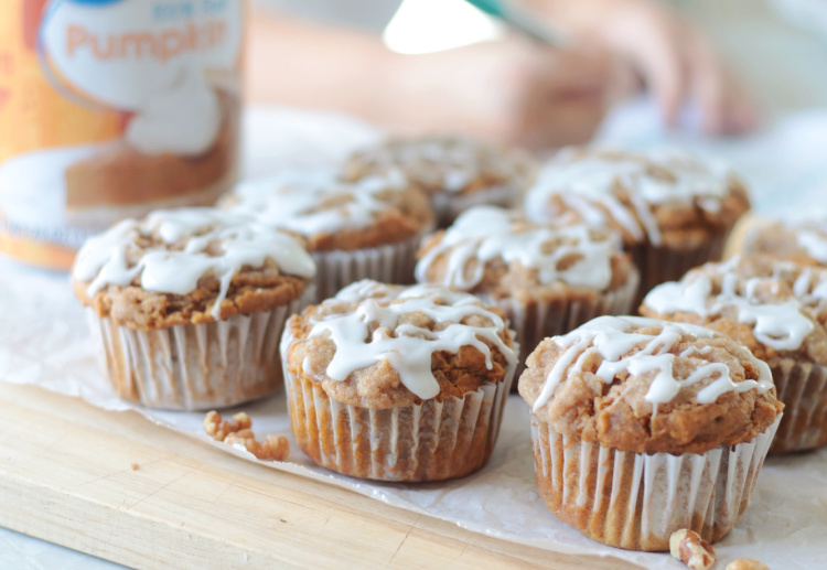 pumpkin muffins on parchment paper and cutting board