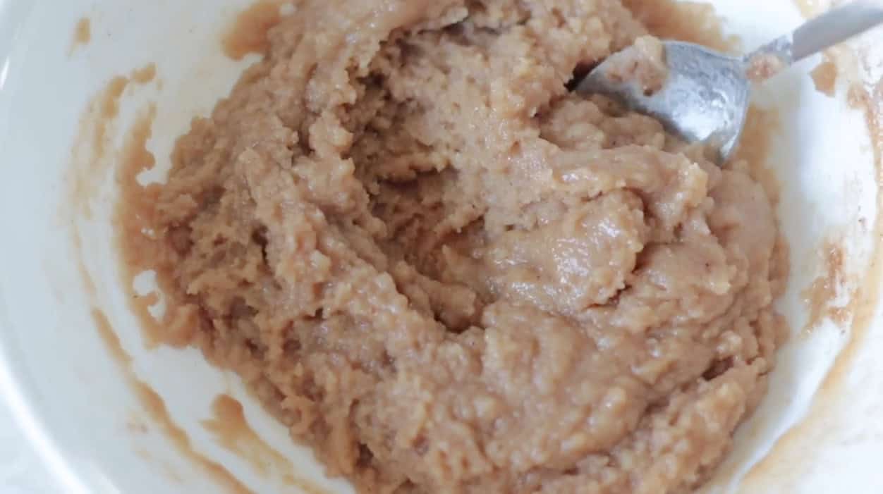 Bowl of streusel topping for pumpkin muffins.