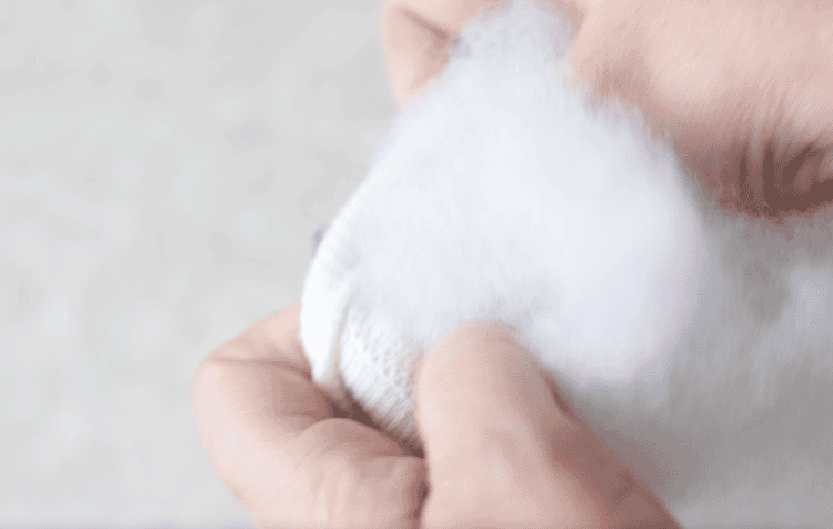 sock being stuffed with pillow stuffing