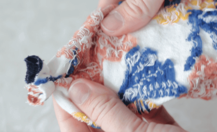 sock inside out and tied with a hair elastic