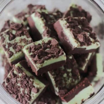 Jar of mint fudge cut into squares.