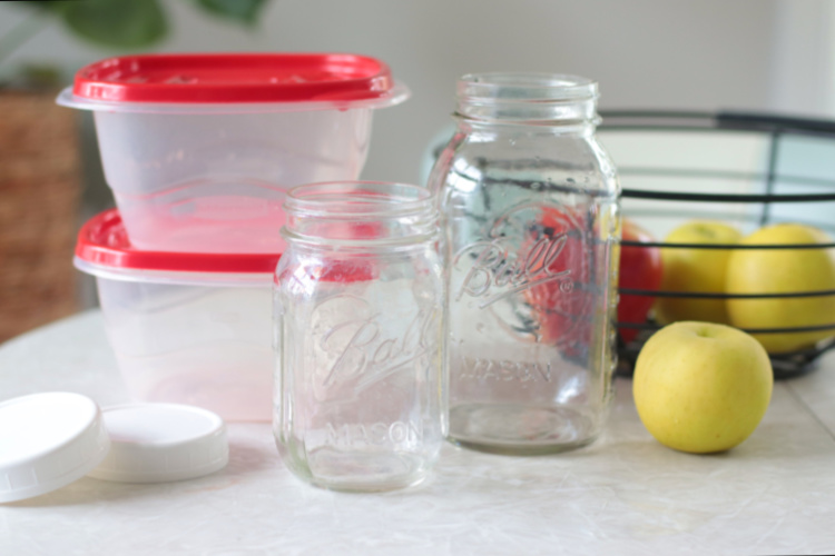 two empty jars and an empty container