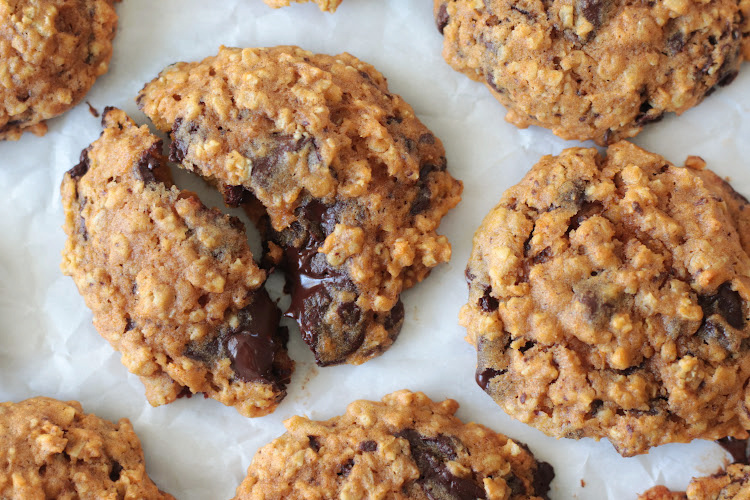 pumpkin oatmeal chocolate chip cookies on parchment paper