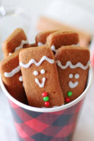 Cup of gingerbread cookie sticks.