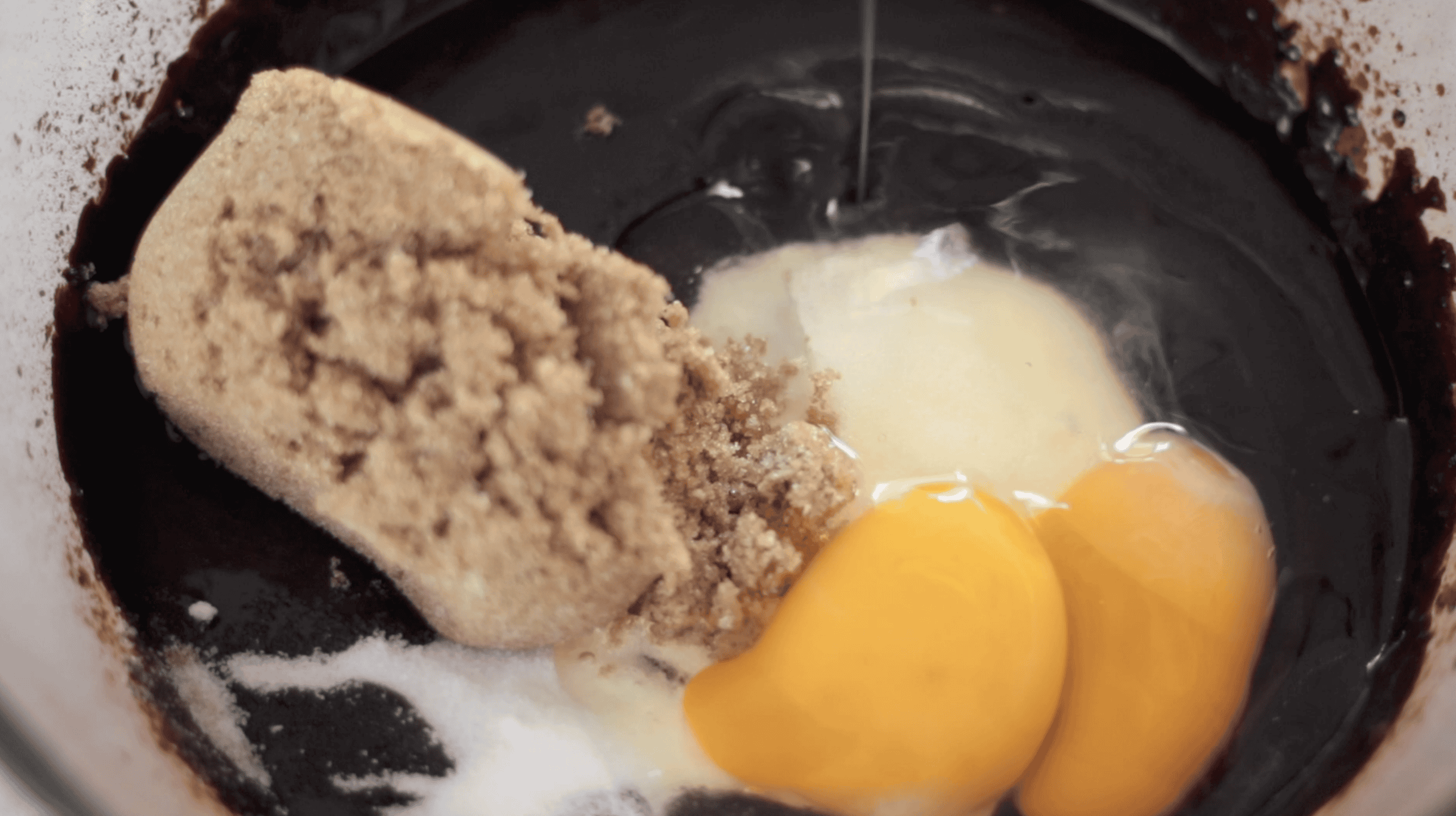 Bowl of sugars and egg.