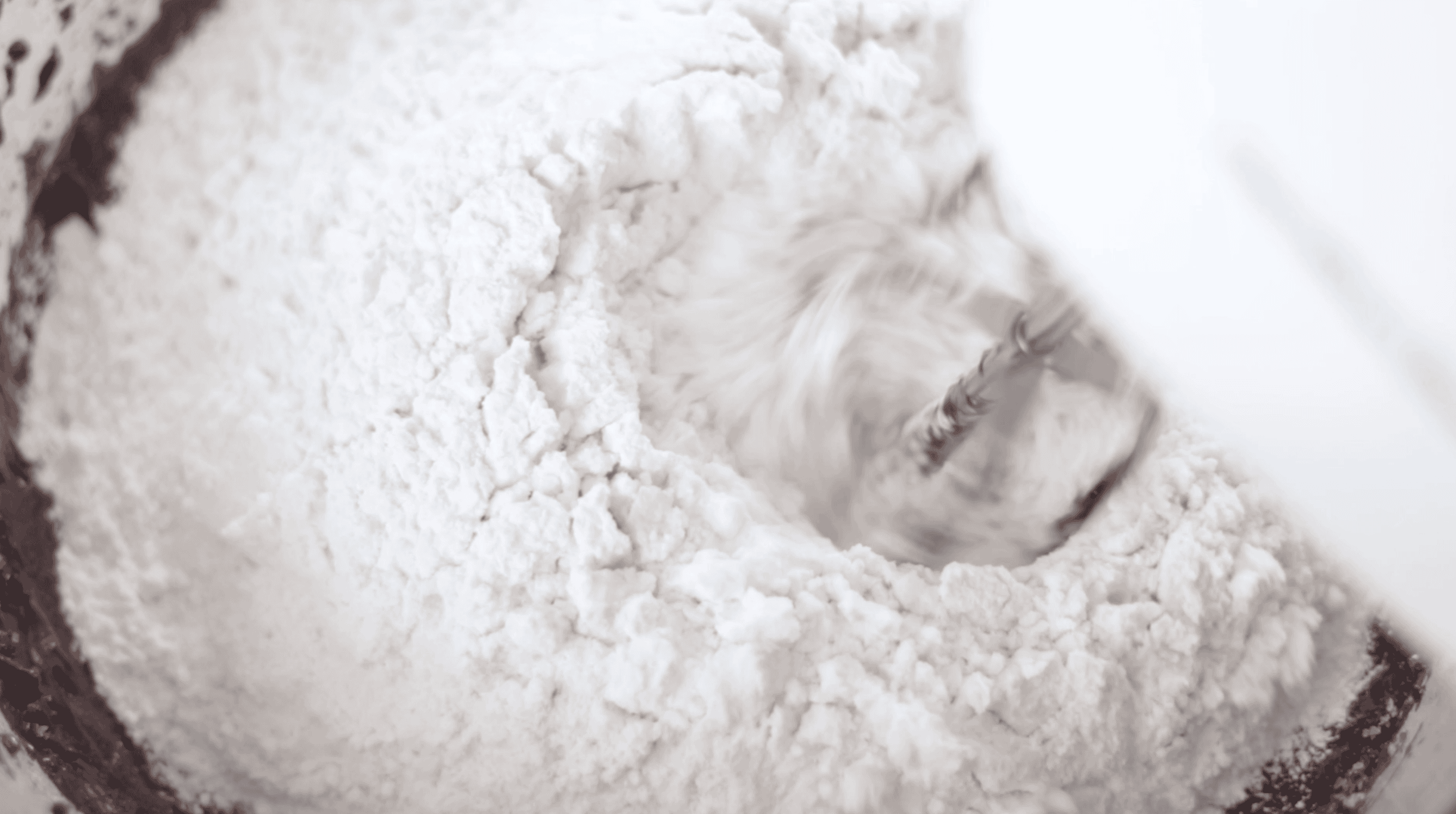 Bowl of dry ingredients being mixed.