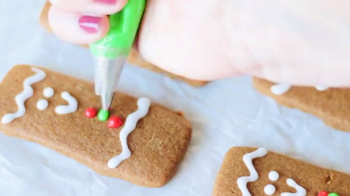 Cookie piped with green and red frosting.