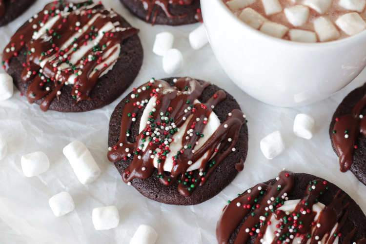 hot cocoa cookies with mug of hot cocoa