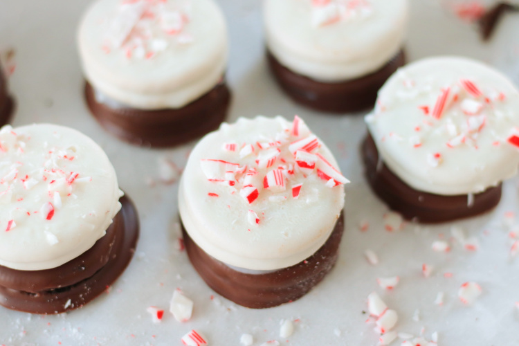 peppermint bark oreos on parchment paper