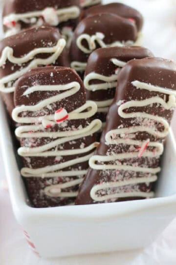 White container of peppermint bark cookies.