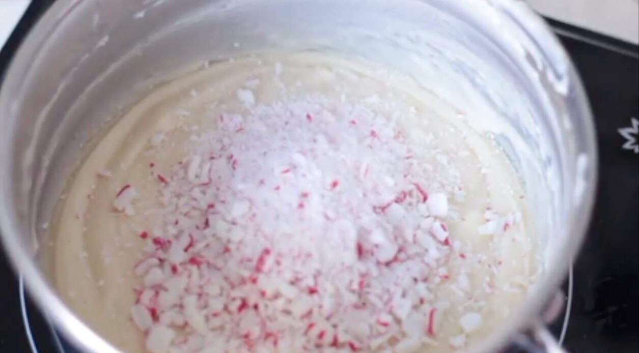 Saucepan with white peppermint base ingredients inside.