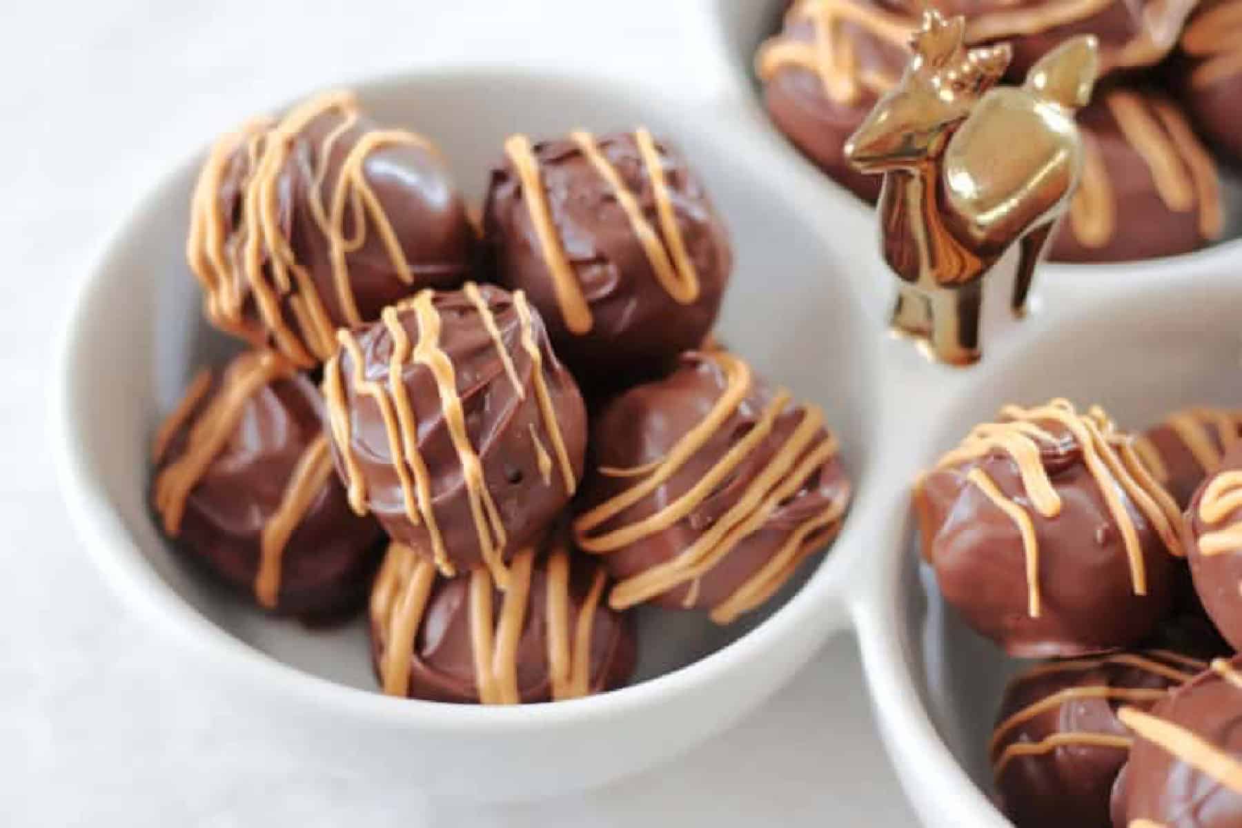White bowl of scotcheroo truffles.