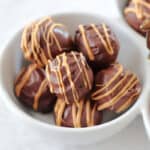 White bowl of scotcheroo truffles.