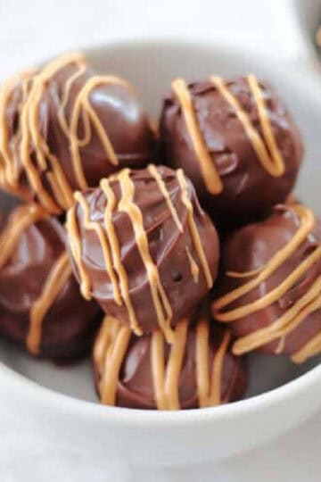 White bowl of scotcheroo truffles.