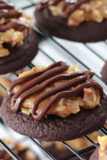 German chocolate cookies on cooling rack.