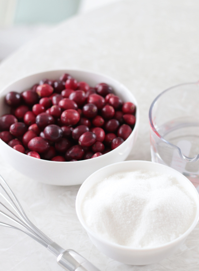 bowls of cranberries, sugar and water