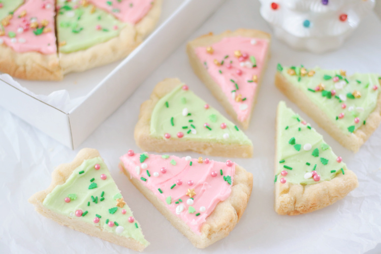 sugar cookie triangles covered with buttercream frosting
