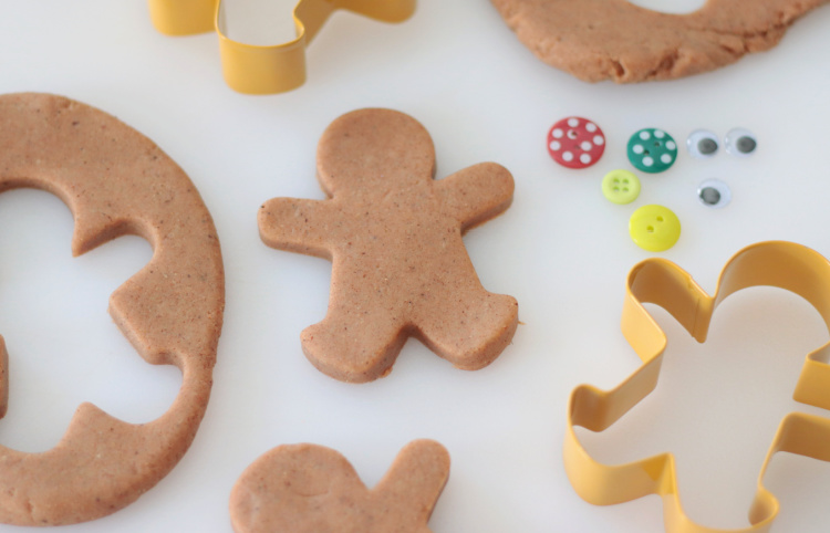 play dough cut into gingerbread man shapes