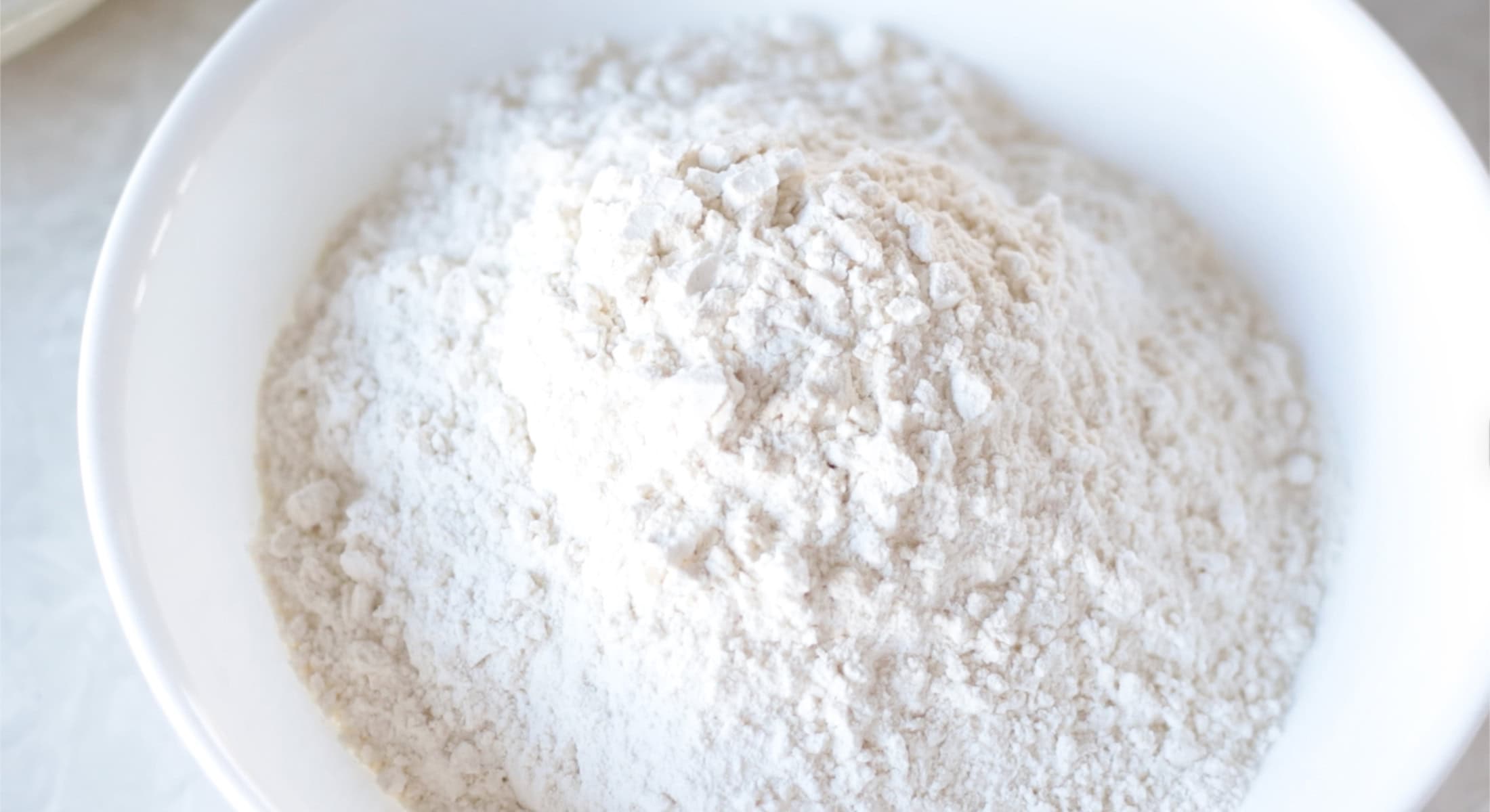 Bowl of flour, baking powder and salt.