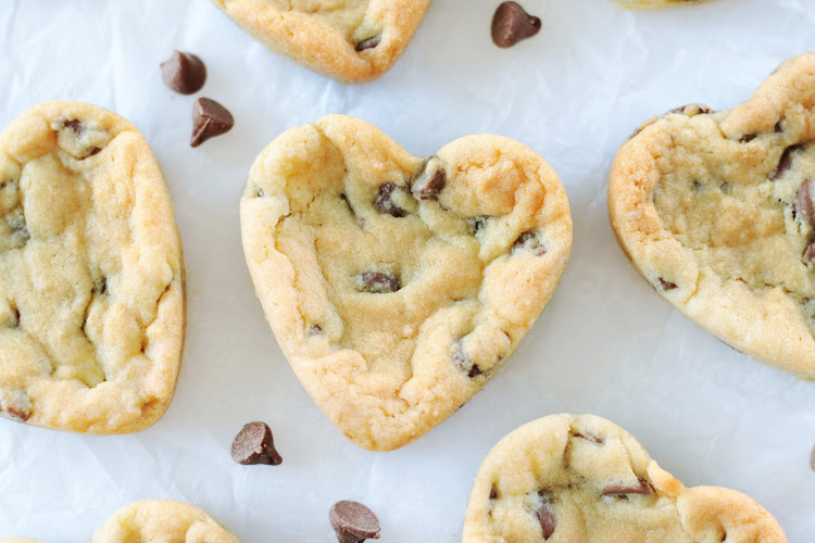heart chocolate chip cookies on parchment paper