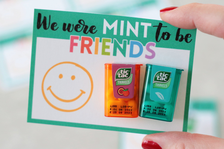 hand holding " we were mint to be friends" valentine card