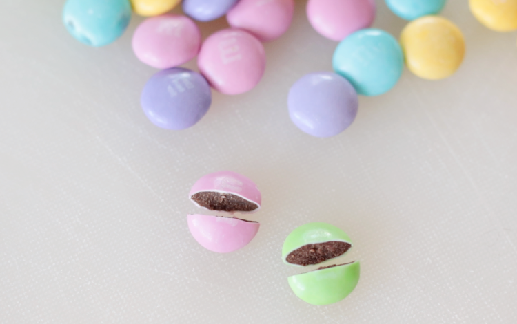 M&M candies cut in half to use as bunny ears