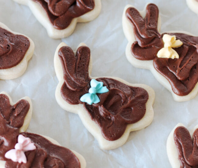 frosted fudge bunny cookies on parchment paper