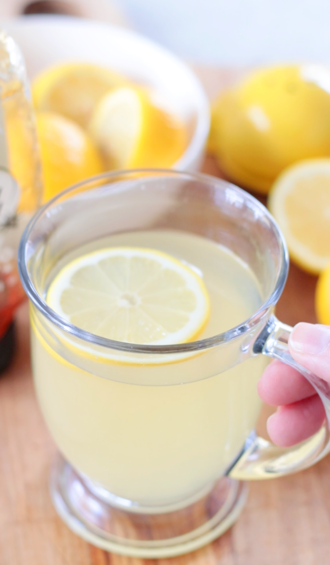 cup of hot lemonade with lemon slice