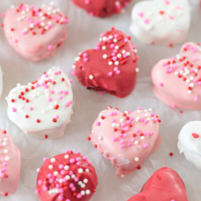 heart-shaped brownie truffles on parchment paper