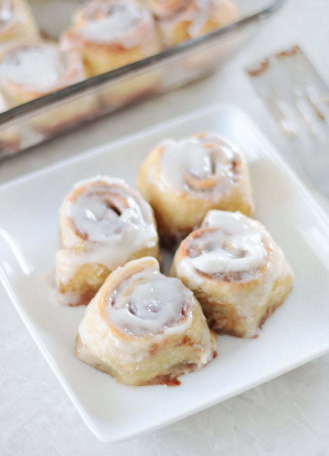 4 mini cinnamon rolls on a plate