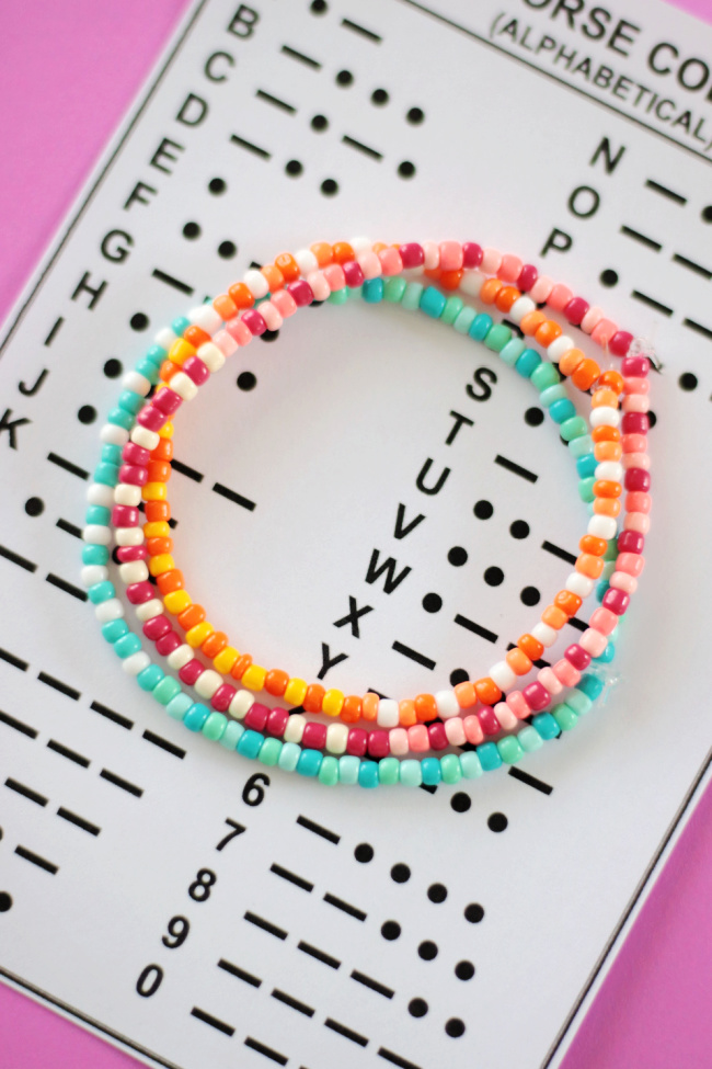 morse code bracelets on top of morse code chart