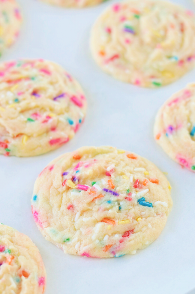funfetti cookies on parchment paper