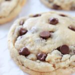 bakery style chocolate chip cookie on parchment paper