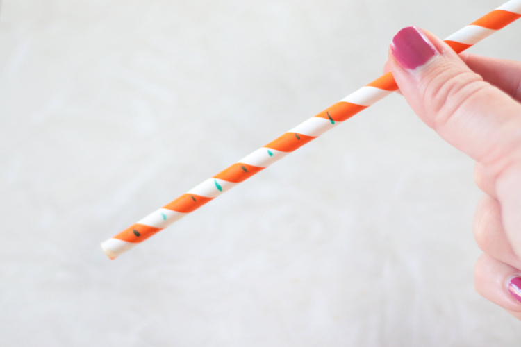 straw with permanent pen markings