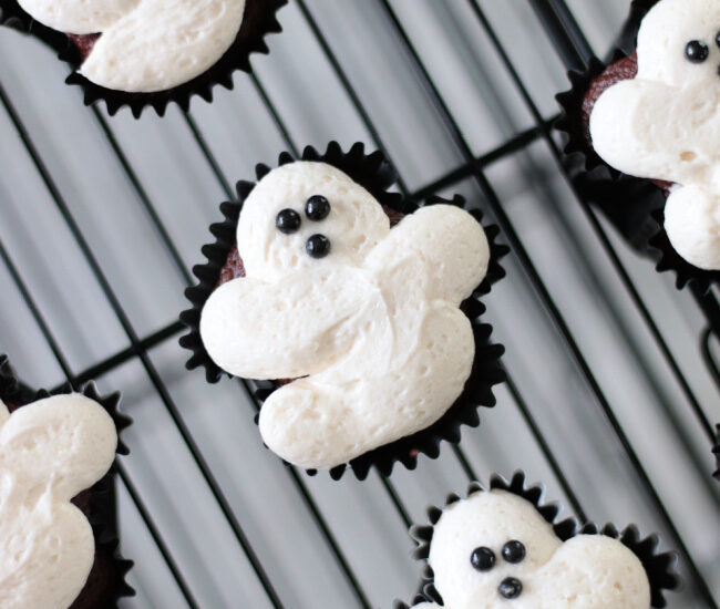 easy ghost cupcakes on cooling rack