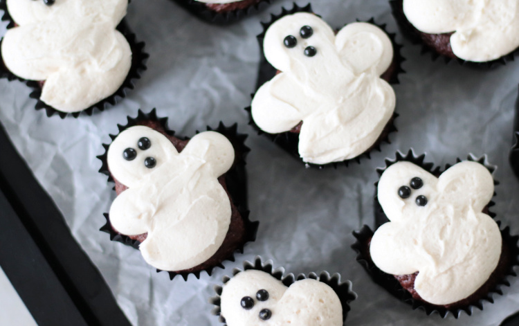 ghost cupcakes on parchment paper