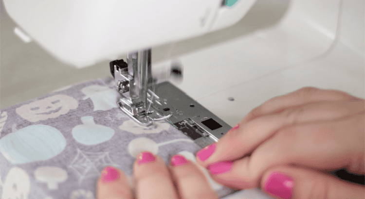 sewing machine stitching side seam of fabric