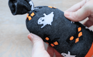 halloween sock stuffed with rice and pillow stuffing